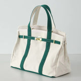 The Weekender Distressed Canvas Buckle Tote